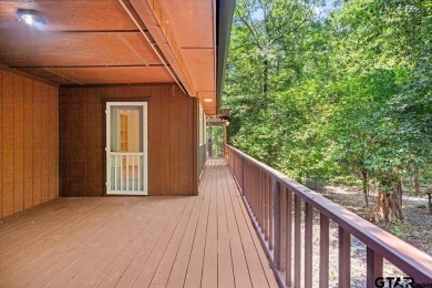 Discover peaceful East Texas living in this spacious 3,052 sq ft on Holly Lake Ranch Golf Club in Texas - for sale on GolfHomes.com, golf home, golf lot