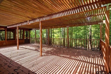 Discover peaceful East Texas living in this spacious 3,052 sq ft on Holly Lake Ranch Golf Club in Texas - for sale on GolfHomes.com, golf home, golf lot