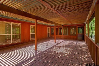Discover peaceful East Texas living in this spacious 3,052 sq ft on Holly Lake Ranch Golf Club in Texas - for sale on GolfHomes.com, golf home, golf lot