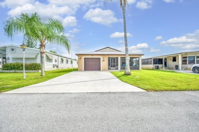Stunning upgrades to this spacious 2bed/2bath home. This home on Spanish Lakes Fairways in Florida - for sale on GolfHomes.com, golf home, golf lot