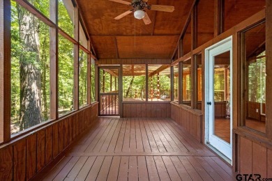 Discover peaceful East Texas living in this spacious 3,052 sq ft on Holly Lake Ranch Golf Club in Texas - for sale on GolfHomes.com, golf home, golf lot