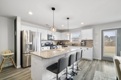 This stunning 4-bedroom, bright and airy home features an open on Woodfin Ridge Golf Club in South Carolina - for sale on GolfHomes.com, golf home, golf lot