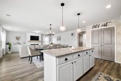 This stunning 4-bedroom, bright and airy home features an open on Woodfin Ridge Golf Club in South Carolina - for sale on GolfHomes.com, golf home, golf lot