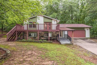 Nestled at the end of a peaceful dead-end street, this inviting on Mountain Ranch Golf Club in Arkansas - for sale on GolfHomes.com, golf home, golf lot