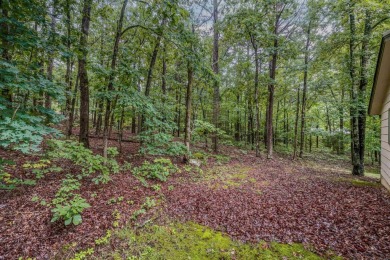 Nestled at the end of a peaceful dead-end street, this inviting on Mountain Ranch Golf Club in Arkansas - for sale on GolfHomes.com, golf home, golf lot