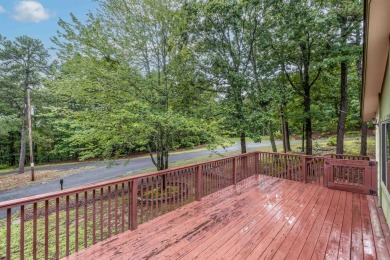 Nestled at the end of a peaceful dead-end street, this inviting on Mountain Ranch Golf Club in Arkansas - for sale on GolfHomes.com, golf home, golf lot