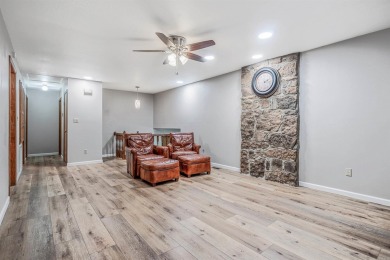 Nestled at the end of a peaceful dead-end street, this inviting on Mountain Ranch Golf Club in Arkansas - for sale on GolfHomes.com, golf home, golf lot