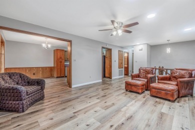 Nestled at the end of a peaceful dead-end street, this inviting on Mountain Ranch Golf Club in Arkansas - for sale on GolfHomes.com, golf home, golf lot