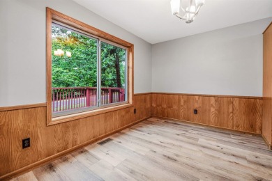 Nestled at the end of a peaceful dead-end street, this inviting on Mountain Ranch Golf Club in Arkansas - for sale on GolfHomes.com, golf home, golf lot