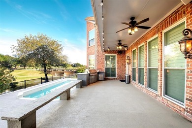 Welcome to your dream home! A stately residence nestled in the on Hackberry Creek Country Club in Texas - for sale on GolfHomes.com, golf home, golf lot