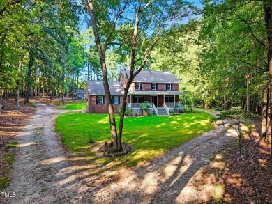 Private and secluded, over 2 acres of tranquil land, No HOA or on Hasentree Club in North Carolina - for sale on GolfHomes.com, golf home, golf lot