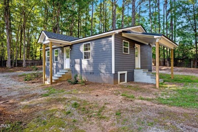 Private and secluded, over 2 acres of tranquil land, No HOA or on Hasentree Club in North Carolina - for sale on GolfHomes.com, golf home, golf lot