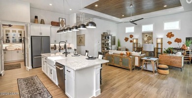 MODEL HOME FOR SALE WITH LEASEBACK OPPORTUNITY! Located in the on Plantation Bay Golf and Country Club in Florida - for sale on GolfHomes.com, golf home, golf lot