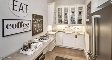 MODEL HOME FOR SALE WITH LEASEBACK OPPORTUNITY! Located in the on Plantation Bay Golf and Country Club in Florida - for sale on GolfHomes.com, golf home, golf lot