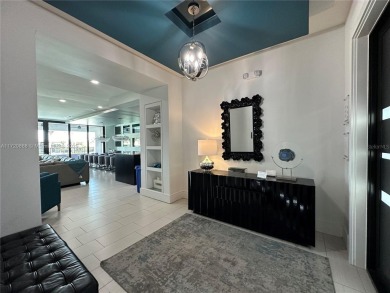 Top-notch luxury home construction. A turnkey, three-story on ChampionsGate Golf Resort in Florida - for sale on GolfHomes.com, golf home, golf lot