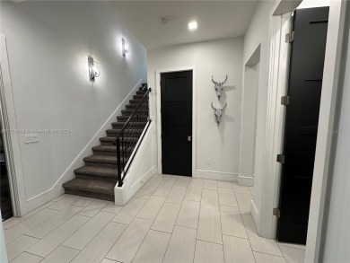Top-notch luxury home construction. A turnkey, three-story on ChampionsGate Golf Resort in Florida - for sale on GolfHomes.com, golf home, golf lot