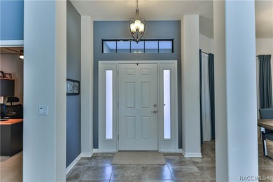 This stunning Move-In Ready 4-bedroom 2-bath POOL home was built on Sugarmill Woods Golf and Country Club in Florida - for sale on GolfHomes.com, golf home, golf lot