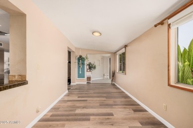 Discover the perfect blend of comfort and lifestyle in highly on Country Meadows Golf Club in Arizona - for sale on GolfHomes.com, golf home, golf lot