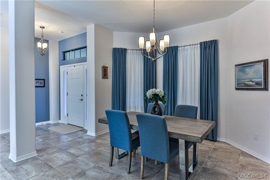 This stunning Move-In Ready 4-bedroom 2-bath POOL home was built on Sugarmill Woods Golf and Country Club in Florida - for sale on GolfHomes.com, golf home, golf lot