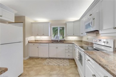 Beautifully turnkey furnished, this spacious 2-bedroom, 2-bath on Eagle Creek Golf and Country Club in Florida - for sale on GolfHomes.com, golf home, golf lot