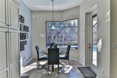 This stunning Move-In Ready 4-bedroom 2-bath POOL home was built on Sugarmill Woods Golf and Country Club in Florida - for sale on GolfHomes.com, golf home, golf lot