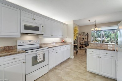 Beautifully turnkey furnished, this spacious 2-bedroom, 2-bath on Eagle Creek Golf and Country Club in Florida - for sale on GolfHomes.com, golf home, golf lot