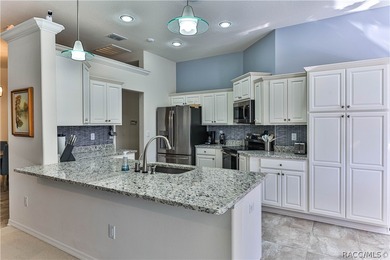 This stunning Move-In Ready 4-bedroom 2-bath POOL home was built on Sugarmill Woods Golf and Country Club in Florida - for sale on GolfHomes.com, golf home, golf lot