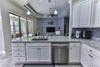 This stunning Move-In Ready 4-bedroom 2-bath POOL home was built on Sugarmill Woods Golf and Country Club in Florida - for sale on GolfHomes.com, golf home, golf lot