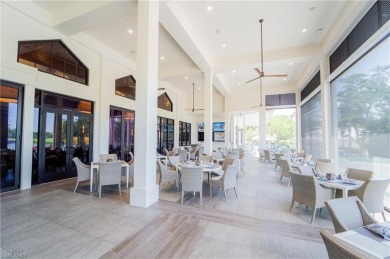 Beautifully turnkey furnished, this spacious 2-bedroom, 2-bath on Eagle Creek Golf and Country Club in Florida - for sale on GolfHomes.com, golf home, golf lot
