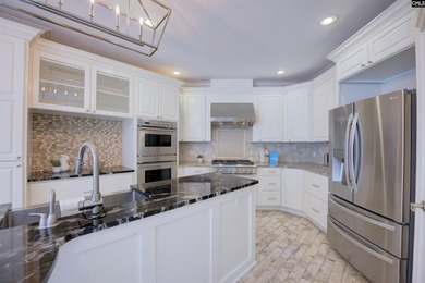 Tucked at the end of a quiet cul-de-sac, this stunning all-brick on The Members Club At Woodcreek in South Carolina - for sale on GolfHomes.com, golf home, golf lot