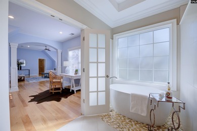 Tucked at the end of a quiet cul-de-sac, this stunning all-brick on The Members Club At Woodcreek in South Carolina - for sale on GolfHomes.com, golf home, golf lot