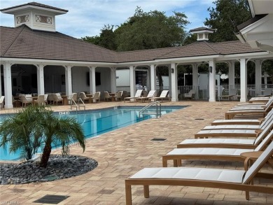 Beautifully turnkey furnished, this spacious 2-bedroom, 2-bath on Eagle Creek Golf and Country Club in Florida - for sale on GolfHomes.com, golf home, golf lot