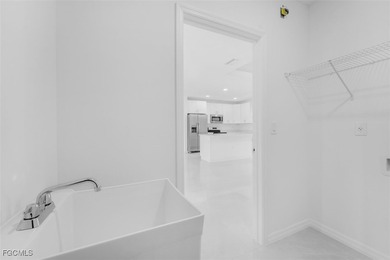 Brand-new construction on a .5-acre lot! This 3 bedroom, 2 bath on Lehigh Resort Club in Florida - for sale on GolfHomes.com, golf home, golf lot