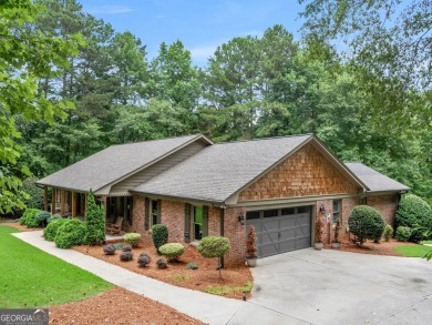 Welcome to 230 Shorewood Ct, nestled in a quiet cul-de-sac in on Canongate At Georgia National Golf Club in Georgia - for sale on GolfHomes.com, golf home, golf lot