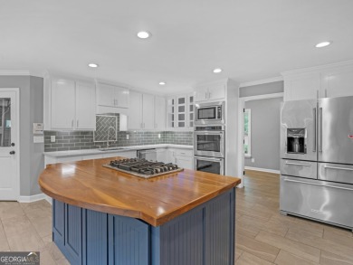 Welcome to 230 Shorewood Ct, nestled in a quiet cul-de-sac in on Canongate At Georgia National Golf Club in Georgia - for sale on GolfHomes.com, golf home, golf lot