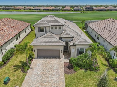 This expansive 2022-built Catalina model in Lakewood National on Lakewood National Golf Club in Florida - for sale on GolfHomes.com, golf home, golf lot