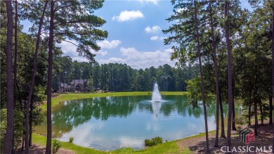 Welcome to your dream home! This like-new, craftsman-style on Reynolds Lake Oconee - The Oconee in Georgia - for sale on GolfHomes.com, golf home, golf lot