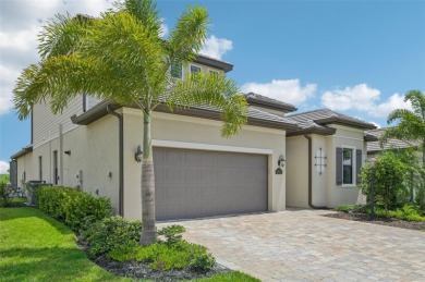 This expansive 2022-built Catalina model in Lakewood National on Lakewood National Golf Club in Florida - for sale on GolfHomes.com, golf home, golf lot