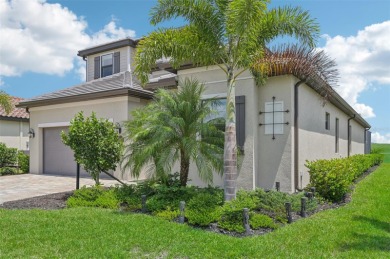 This expansive 2022-built Catalina model in Lakewood National on Lakewood National Golf Club in Florida - for sale on GolfHomes.com, golf home, golf lot