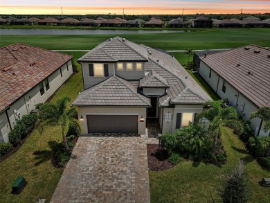 This expansive 2022-built Catalina model in Lakewood National on Lakewood National Golf Club in Florida - for sale on GolfHomes.com, golf home, golf lot