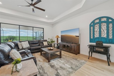 This expansive 2022-built Catalina model in Lakewood National on Lakewood National Golf Club in Florida - for sale on GolfHomes.com, golf home, golf lot