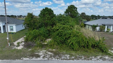 Location! Location! This is a .28 acre lot across the canal from on Mirror Lakes Golf Club in Florida - for sale on GolfHomes.com, golf home, golf lot