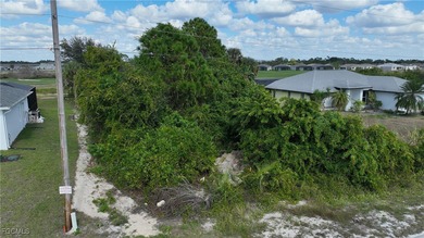 Location! Location! This is a .28 acre lot across the canal from on Mirror Lakes Golf Club in Florida - for sale on GolfHomes.com, golf home, golf lot