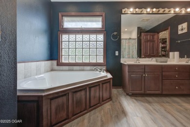 Beautiful 4 bedroom, 3 bath brick home in the heart of Monett on Windmill Ridge Golf Course in Missouri - for sale on GolfHomes.com, golf home, golf lot