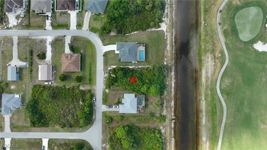 Location! Location! This is a .28 acre lot across the canal from on Mirror Lakes Golf Club in Florida - for sale on GolfHomes.com, golf home, golf lot