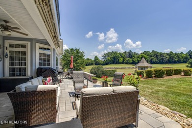 GOLF COURSE, POND and WATERFALL VIEWS from the back patio on Rarity Bay Country Club - Loudon in Tennessee - for sale on GolfHomes.com, golf home, golf lot