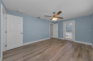 Welcome to this stunning renovated 4-bedroom, 3-bathroom pool on The Dunedin Country Club in Florida - for sale on GolfHomes.com, golf home, golf lot