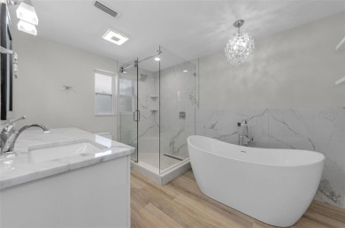 Welcome to this stunning renovated 4-bedroom, 3-bathroom pool on The Dunedin Country Club in Florida - for sale on GolfHomes.com, golf home, golf lot