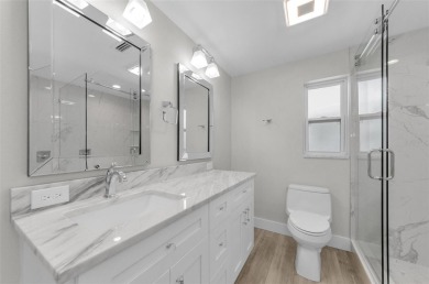 Welcome to this stunning renovated 4-bedroom, 3-bathroom pool on The Dunedin Country Club in Florida - for sale on GolfHomes.com, golf home, golf lot