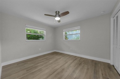 Welcome to this stunning renovated 4-bedroom, 3-bathroom pool on The Dunedin Country Club in Florida - for sale on GolfHomes.com, golf home, golf lot